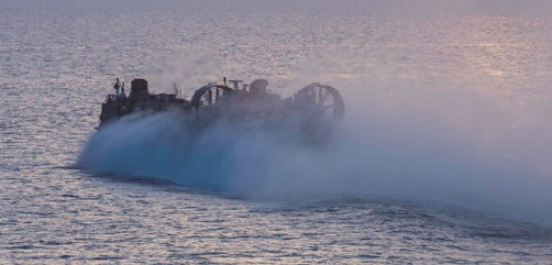 A Navy air-cushioned landing craft exits the well deck of the USS Bataan in the Persian Gulf, Feb. 23, 2020. - ALLOW IMAGES