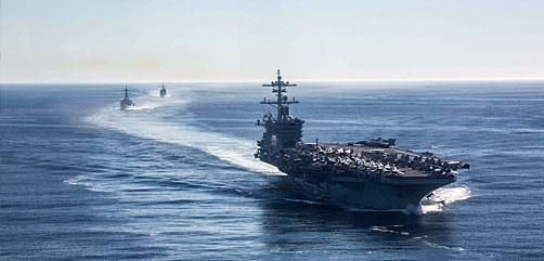 The USS Abraham Lincoln, the USS Fitzgerald and the USS Mobile Bay sail in formation in the Pacific Ocean, Nov. 13, 2021. - ALLOW IMAGES