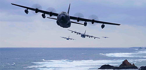 Four Air Force MC-130J Command IIs fly in formation off the coast of Okinawa, Japan, Jan. 6, 2021. - ALLOW IMAGES