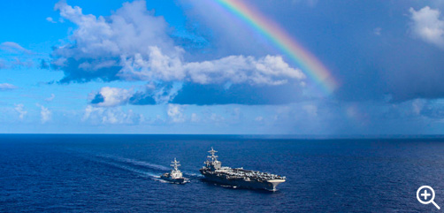 Click to Enlarge - The USS Spruance conducts a replenishment with the USS Abraham Lincoln in the Philippine Sea, June 19, 2022. - ALLOW IMAGES