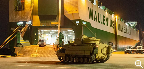 A Bradley Fighting Vehicle loads onto the ARC Integrity Jan. 25, 2023, at the Transportation Core Dock in North Charleston, South Carolina. More than 60 Bradleys were shipped by U.S. Transportation Command as part of the U.S. military aid package to Ukraine. The Bradleys are shipped with the barrels of the 25mm M242 chain guns removed, to be reinstalled after arrival.  U.S. Transportation Command photo by Oz Suguitan  - ALLOW IMAGES