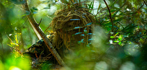 Marine Corps Cpl. Cameron Scott participates in a camouflage class during training at Marine Corps Recruit Depot Parris Island, S.C., Jan. 26, 2022. - ALLOW IMAGES