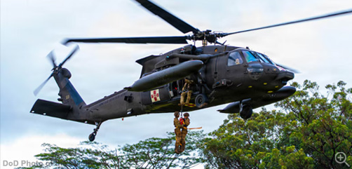 Soldiers conduct hoist operations with an Army UH-60 Black Hawk helicopter during aeromedical evacuation training as part of the jungle operations training course at Lightning Academy at Schofield Barracks, Hawaii, Sept. 19, 2026.  - ALLOW IMAGES.